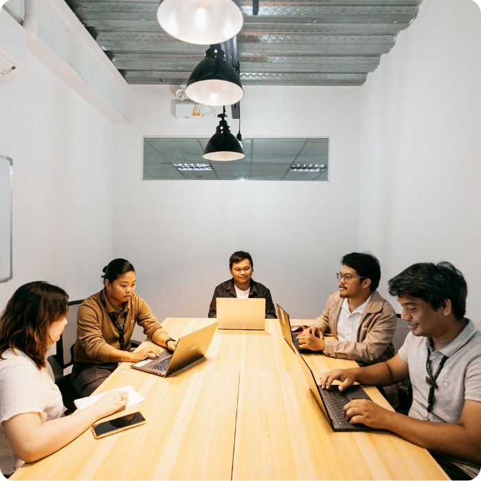 A workforce in Cebu Philippines in a cozy productive meeting room at Zero-Ten Park PH